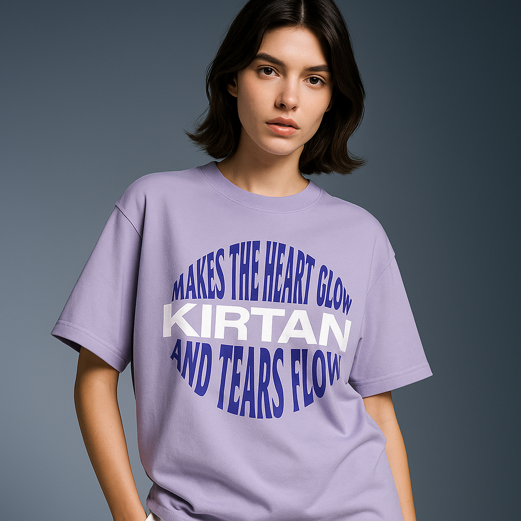 Person wearing a purple t-shirt with text on a gray background