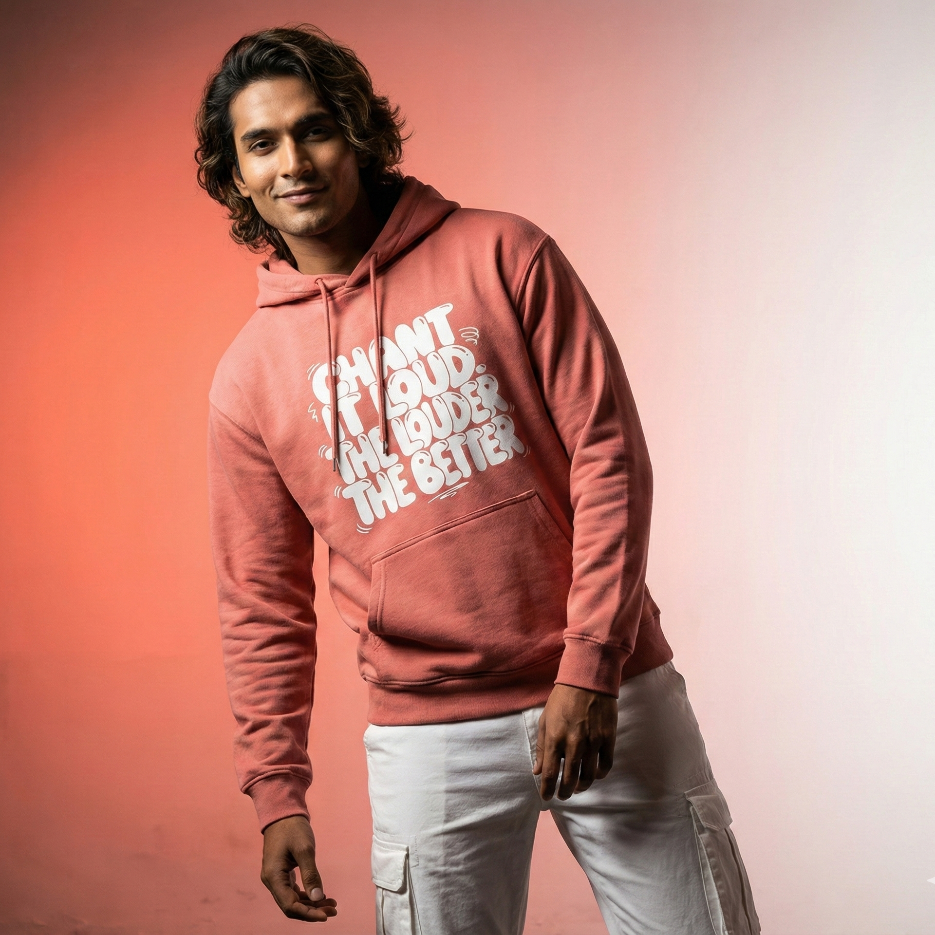 Person wearing a pink hoodie with text on a gradient background
