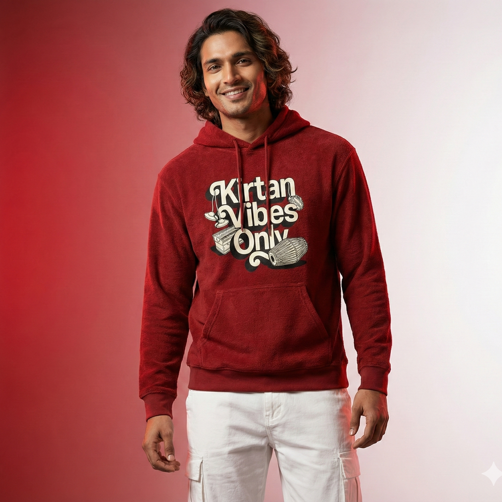 Person wearing a red hoodie with 'Kirtan Vibes Only' text on a gradient background