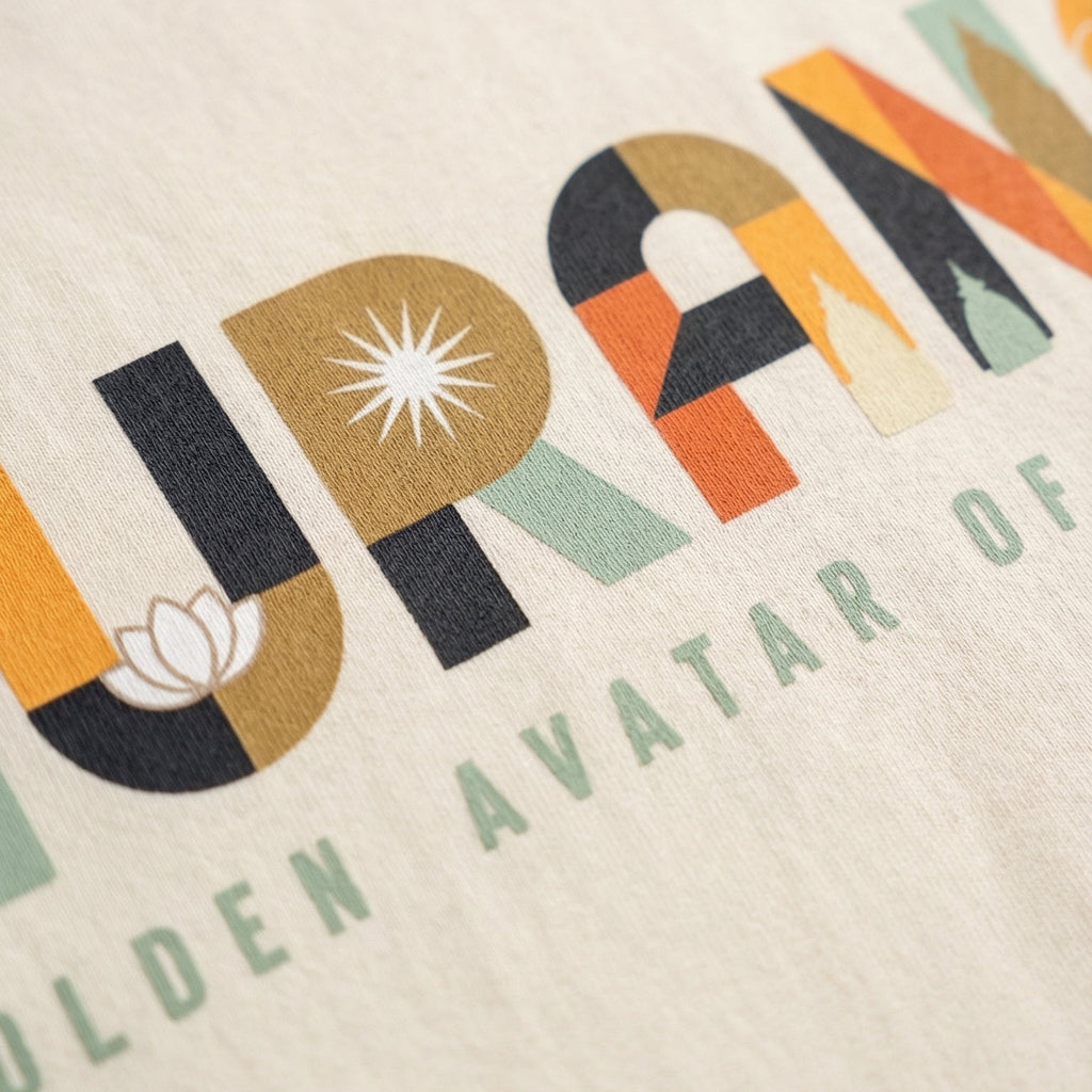 Close-up of a shirt with colorful text design on a beige background