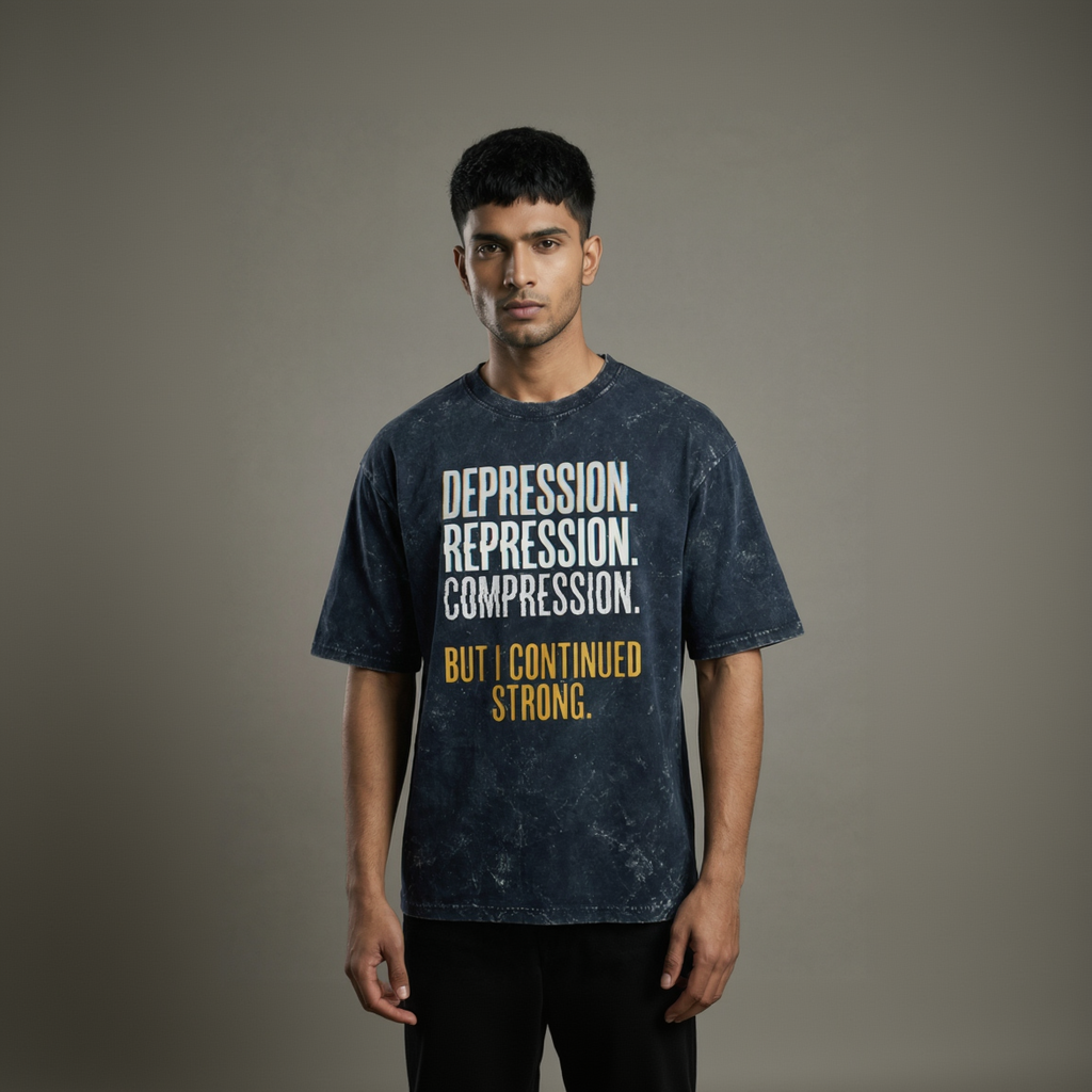 Person wearing a t-shirt with motivational text on a plain background