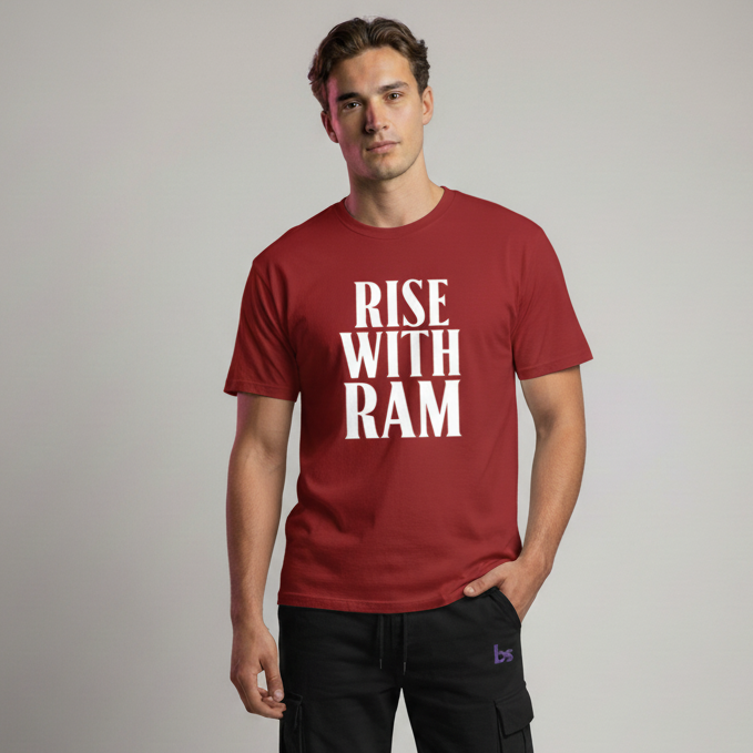 Man wearing a red t-shirt with 'Rise With Ram' text on a plain background